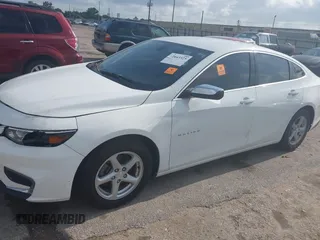 2018 Chevrolet Malibu LT z VIN 1G1ZD5ST9JF125831, wystawiony jako IAAI lot #42443325 z przebiegiem Nie podano mil oraz . Historia ofert i sprzedaży dostępna na DreamBid. Obrazek 6.