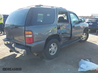 2002 Chevrolet Tahoe LT with VIN 1GNEC13Z12J233208, listed as a IAAI auction lot 41659873 with 238,922 mi miles. Bid and sale history available at carsss.com. Image 4.