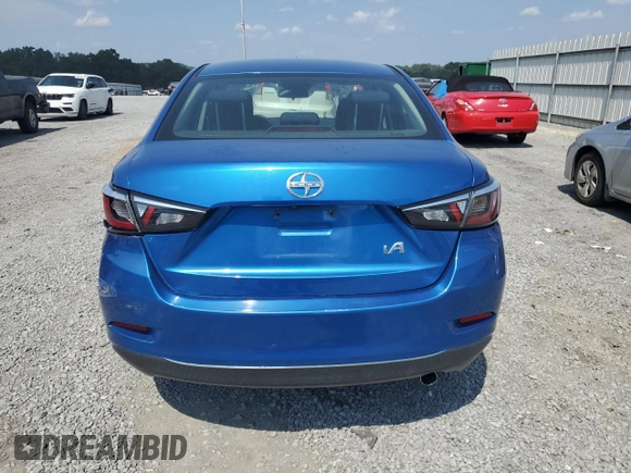 2016 Scion iA with VIN 3MYDLBZV6GY143071, listed as a Copart auction lot 69697704 with 97,689 mi miles and Salvage Title. Bid and sale history available at carsss.com. Image 6.