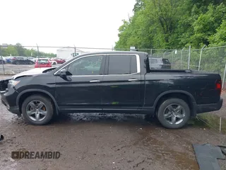 2021 Honda Ridgeline RTL-E with VIN 5FPYK3F75MB015370, listed as a IAAI auction lot 42253586 with 84,188 mi miles and . Bid and sale history available at DreamBid. Image 14.