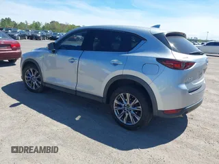 2019 Mazda CX-5 Grand Touring with VIN JM3KFADM1K1606082, listed as a IAAI auction lot 41875878 with 66,089 mi miles. Bid and sale history available at carsss.com. Image 3.