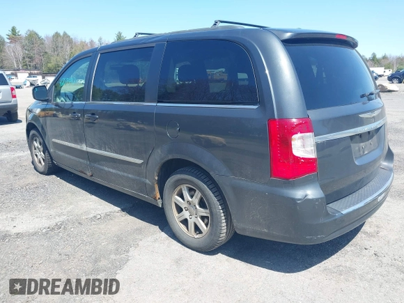 2012 Chrysler Town & Country Touring with VIN 2C4RC1BG4CR189809, listed as a IAAI auction lot 42093962 with 180,324 mi miles. Bid and sale history available at carsss.com. Image 3.