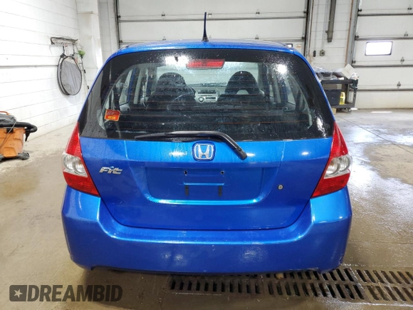 2007 Honda Fit with VIN JHMGD37447S041337, listed as a Copart auction lot 60352955 with 222,726 mi miles and Clean title. Bid and sale history available at DreamBid. Image 6.
