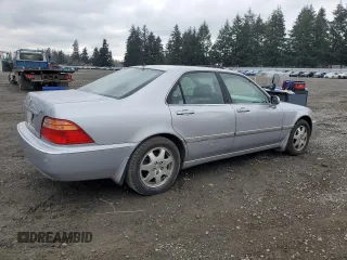 2002 Acura RL с VIN JH4KA96682C010796, выставлен на аукционе Copart как лот 42249145 с пробегом 246 683 миль миль и Списание • Salvage title. История ставок и продаж доступна на DreamBid. Изображение 3.