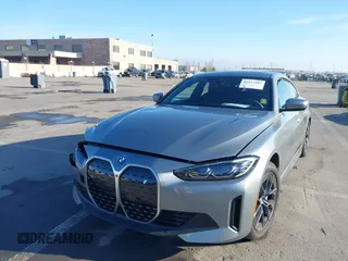 2024 BMW i4 eDrive40 with VIN WBY73AW05RFT33063, listed as a IAAI auction lot 41127587 with 1 mi miles. Bid and sale history available at carsss.com. Image 21.