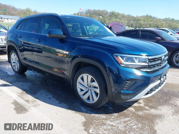 2021 Volkswagen Atlas SE z VIN 1V2KE2CA7MC220524, wystawiony jako IAAI lot #42017287 z przebiegiem 29 380 mil mil oraz . Historia ofert i sprzedaży dostępna na DreamBid. Obrazek 1.