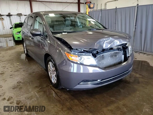 2014 Honda Odyssey EX-L with VIN 5FNRL5H6XEB134849, listed as a Copart auction lot 63617435 with 127,491 mi miles and Salvage title. Bid and sale history available at DreamBid. Image 14.