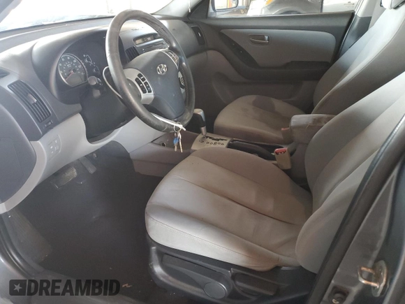2009 Hyundai Elantra SE z VIN KMHDU46D49U605681, wystawiony jako Copart lot #55157225 z przebiegiem 220 774 mil mil oraz Szkoda całkowita • Salvage title. Historia ofert i sprzedaży dostępna na DreamBid. Obrazek 7.