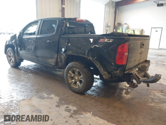 2019 Chevrolet Colorado 4WD Z71 with VIN 1GCGTDEN2K1121689, listed as a IAAI auction lot 42201118 with 96,351 mi miles and . Bid and sale history available at DreamBid. Image 3.