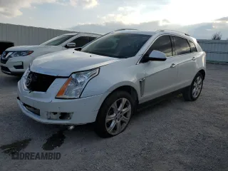 2013 Cadillac SRX Premium Collection with VIN 3GYFNEE38DS621104, listed as a Copart auction lot 52788915 with 125,605 mi miles and Salvage title. Bid and sale history available at DreamBid. Image 1.