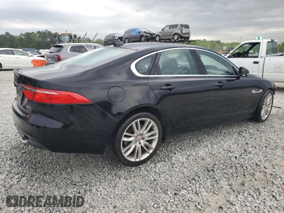 2016 Jaguar XF 35t Prestige with VIN SAJBE4BVXGCY03824, listed as a Copart auction lot 52516645 with 96,616 mi miles and Salvage Title. Bid and sale history available at carsss.com. Image 3.
