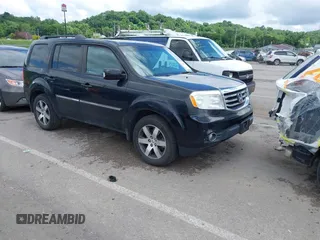2012 Honda Pilot Touring with VIN 5FNYF4H96CB047843, listed as a IAAI auction lot 42516056 with 178,283 mi miles and . Bid and sale history available at DreamBid. Image 1.