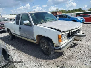 1994 GMC Sierra 1500 with VIN 1GTEC19KXRE557960, listed as a Copart auction lot 71677974 with 194,641 mi miles and Salvage Title. Bid and sale history available at DreamBid. Image 4.