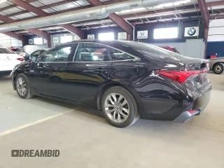 2020 Toyota Avalon Hybrid XLE z VIN 4T1A21FB3LU013217, wystawiony jako Copart lot #59955515 z przebiegiem 302 338 mil mil oraz Czysty tytuł • Clean title. Historia ofert i sprzedaży dostępna na DreamBid. Obrazek 2.