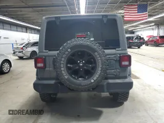 2021 Jeep Wrangler Unlimited Willys with VIN 1C4HJXDN3MW570110, listed as a Copart auction lot 53696535 with 40,166 mi miles and Salvage title. Bid and sale history available at DreamBid. Image 6.