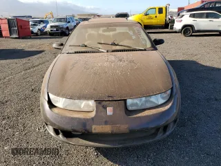 1999 Saturn SC with VIN 1G8ZR1274XZ262181, listed as a Copart auction lot 75931774 with Not Provided miles and Salvage Title. Bid and sale history available at carsss.com. Image 5.
