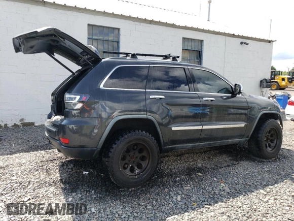 2011 Jeep Grand Cherokee Limited with VIN 1J4RR5GT2BC677640, listed as a Copart auction lot 68012754 with 138,208 mi miles and Salvage title. Bid and sale history available at DreamBid. Image 3.