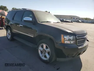 2009 Chevrolet Tahoe LTZ with VIN 1GNFK33089R139455, listed as a Copart auction lot 58953995 with 176,029 mi miles and Salvage title. Bid and sale history available at DreamBid. Image 4.