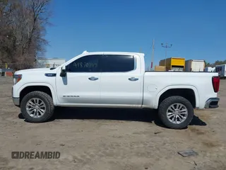 2022 GMC Sierra 1500 SLT with VIN 3GTU9DET9NG210715, listed as a IAAI auction lot 41870747 with 61,371 mi miles and . Bid and sale history available at DreamBid. Image 14.