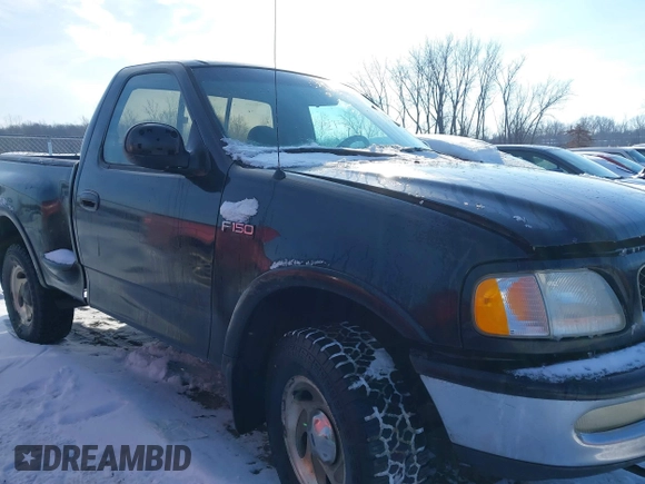 1997 Ford F-150 XL with VIN 1FTDF08W5VKD47103, listed as a IAAI auction lot 41345739 with 209,732 mi miles. Bid and sale history available at carsss.com. Image 13.