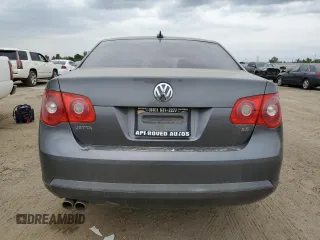 2006 Volkswagen Jetta z VIN 3VWDG71K66M748387, wystawiony jako Copart lot #55269553 z przebiegiem 141 937 mil mil oraz Czysty tytuł • Clean title. Historia ofert i sprzedaży dostępna na DreamBid. Obrazek 6.