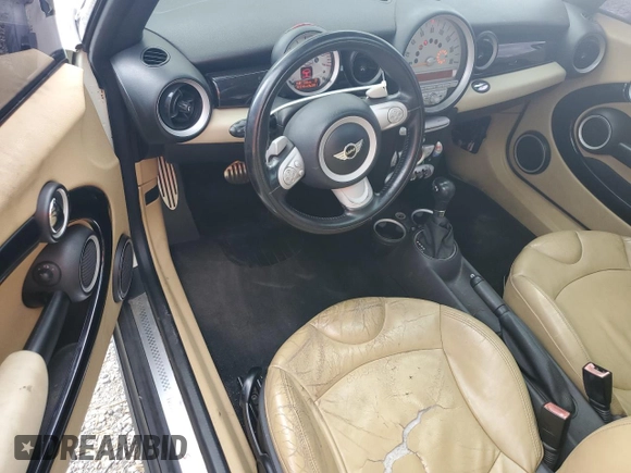 2010 MINI Hardtop S with VIN WMWMF7C5XATW89025, listed as a Copart auction lot 56106705 with 141,216 mi miles and Salvage title. Bid and sale history available at DreamBid. Image 8.