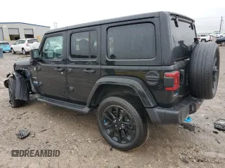 2023 Jeep Wrangler Sahara z VIN 1C4JJXP62PW514489, wystawiony jako Copart lot #51811585 z przebiegiem 39 174 mil mil oraz Szkoda całkowita • Salvage title. Historia ofert i sprzedaży dostępna na DreamBid. Obrazek 2.