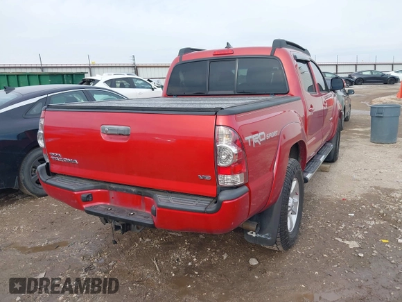 2015 Toyota Tacoma with VIN 3TMLU4EN8FM189953, listed as a IAAI auction lot 41584110 with 126,833 mi miles and . Bid and sale history available at DreamBid. Image 4.