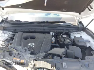 2024 Mazda CX-50 S Select с VIN 7MMVABAM9RN238736, выставлен на аукционе IAAI как лот 42003658 с пробегом 9 880 миль миль и . История ставок и продаж доступна на DreamBid. Изображение 10.