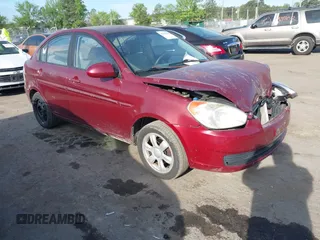 2006 Hyundai Accent GLS z VIN KMHCN46C66U061129, wystawiony jako IAAI lot #42072699 z przebiegiem 163 573 mil mil oraz . Historia ofert i sprzedaży dostępna na DreamBid. Obrazek 1.