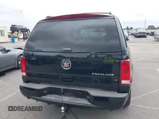 2005 Cadillac Escalade z VIN 1GYEC63T95R181022, wystawiony jako IAAI lot #41777173 z przebiegiem 44 348 mil mil oraz . Historia ofert i sprzedaży dostępna na DreamBid. Obrazek 15.