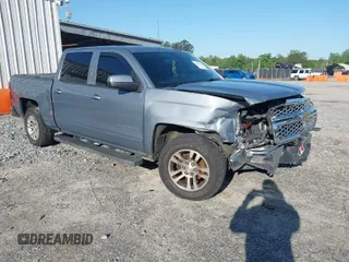 2015 Chevrolet Silverado 1500 LT with VIN 3GCPCREC7FG360657, listed as a IAAI auction lot 41747526 with 130,950 mi miles and . Bid and sale history available at DreamBid. Image 1.