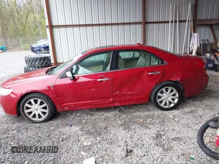 2010 Lincoln MKZ with VIN 3LNHL2GC0AR631012, listed as a IAAI auction lot 42003514 with 115,553 mi miles. Bid and sale history available at carsss.com. Image 14.