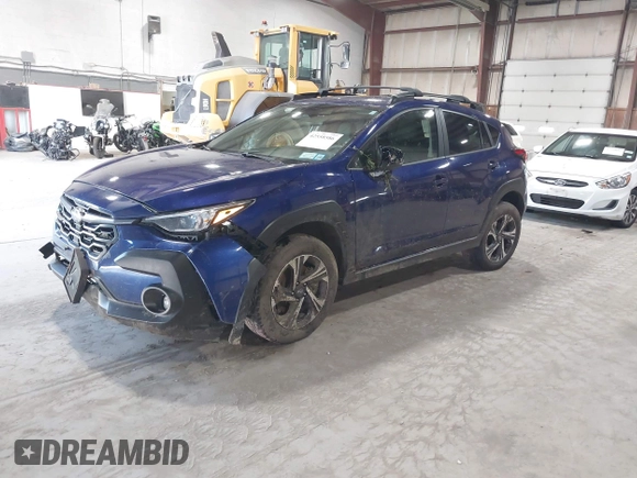 2024 Subaru Crosstrek Premium z VIN JF2GUADC3R8318644, wystawiony jako IAAI lot #42558586 z przebiegiem 33 648 mil mil oraz . Historia ofert i sprzedaży dostępna na DreamBid. Obrazek 17.