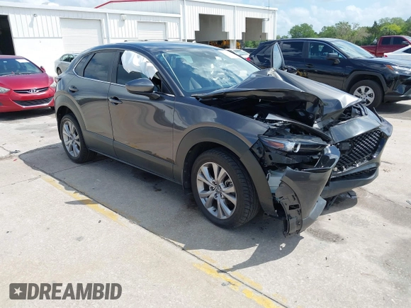 2021 Mazda CX-30 Select with VIN 3MVDMBBL2MM261169, listed as a IAAI auction lot 41938783 with 74,996 mi miles. Bid and sale history available at carsss.com. Image 1.
