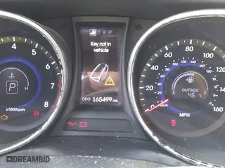 2013 Hyundai Santa Fe Sport with VIN 5XYZUDLB8DG058146, listed as a IAAI auction lot 41997471 with 165,499 mi miles. Bid and sale history available at carsss.com. Image 7.