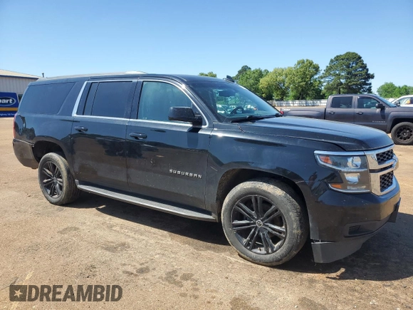 2019 Chevrolet Suburban LS with VIN 1GNSCGECXKR208615, listed as a Copart auction lot 52187105 with 174,105 mi miles and Salvage title. Bid and sale history available at DreamBid. Image 4.