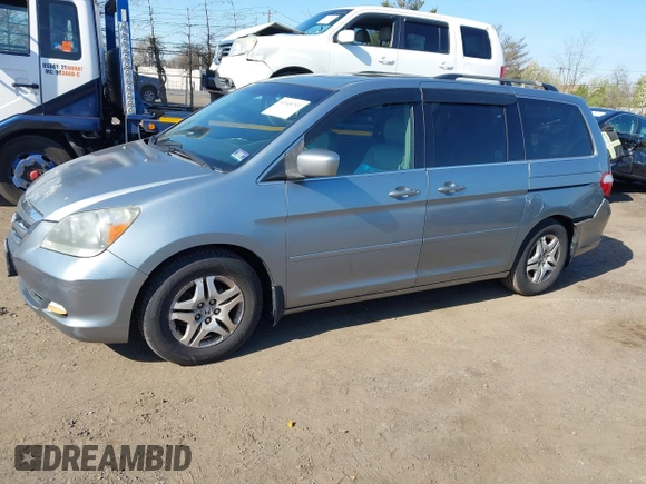 2006 Honda Odyssey EX-L with VIN 5FNRL38696B077792, listed as a IAAI auction lot 42048793 with 149,868 mi miles and . Bid and sale history available at carsss.com. Image 2.