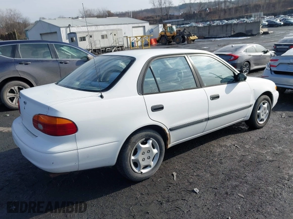 2001 Chevrolet Prizm z VIN 1Y1SK52871Z432340, wystawiony jako IAAI lot #41465388 z przebiegiem 122 272 mil mil oraz . Historia ofert i sprzedaży dostępna na DreamBid. Obrazek 4.