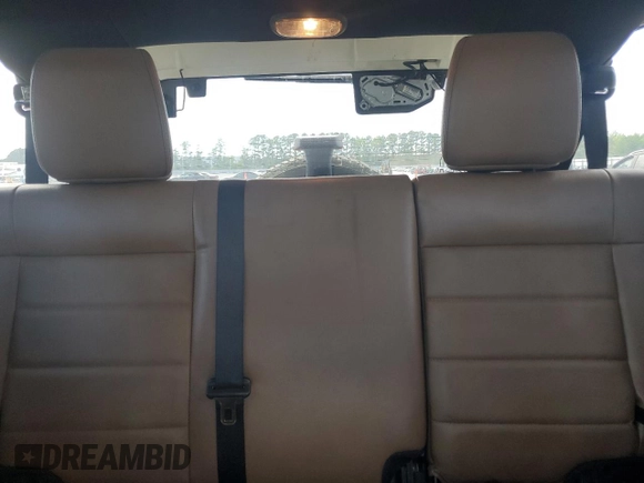 2012 Jeep Wrangler Unlimited Sahara with VIN 1C4HJWEG5CL205826, listed as a Copart auction lot 58222115 with 98,940 mi miles and Salvage title. Bid and sale history available at DreamBid. Image 10.
