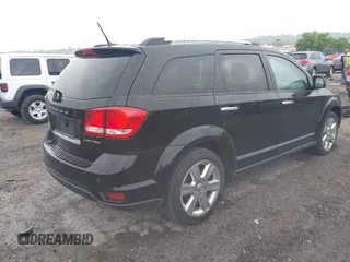2014 Dodge Journey Limited with VIN 3C4PDDDG4ET141164, listed as a IAAI auction lot 42255057 with 195,135 mi miles and . Bid and sale history available at DreamBid. Image 4.