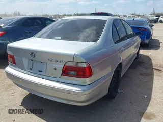 2003 BMW 5 Series 530iA with VIN WBADT63443CK38704, listed as a IAAI auction lot 41779122 with 103,198 mi miles. Bid and sale history available at carsss.com. Image 4.