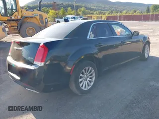2015 Chrysler 300 Limited with VIN 2C3CCAAGXFH779843, listed as a IAAI auction lot 40284433 with 251,182 mi miles and . Bid and sale history available at DreamBid. Image 4.