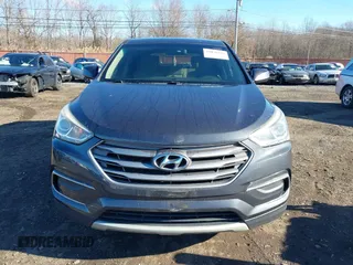 2017 Hyundai Santa Fe 2.4L with VIN 5XYZTDLB0HG453575, listed as a IAAI auction lot 41036334 with 114,031 mi miles and . Bid and sale history available at DreamBid. Image 12.