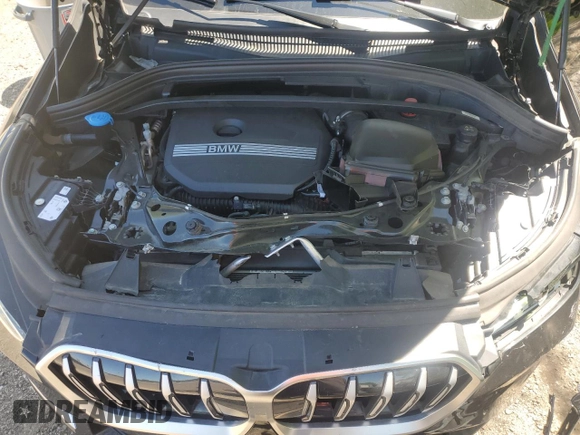 2023 BMW X1 xDrive28i with VIN WBX73EF04P5X86962, listed as a Copart auction lot 57575815 with 95,965 mi miles and Salvage title. Bid and sale history available at DreamBid. Image 12.