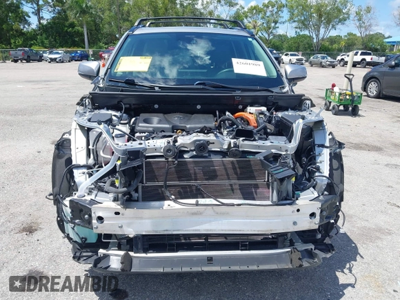 2021 Toyota RAV4 Hybrid LE with VIN 2T3B6RFV2MW018967, listed as a IAAI auction lot 42601989 with 71,046 mi miles and . Bid and sale history available at DreamBid. Image 13.