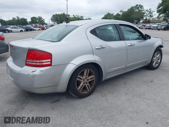 2008 Dodge Avenger SXT with VIN 1B3LC56K98N213958, listed as a IAAI auction lot 41829798 with 128,123 mi miles. Bid and sale history available at carsss.com. Image 4.