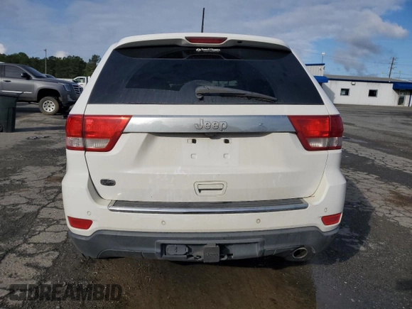 2013 Jeep Grand Cherokee Overland with VIN 1C4RJECG8DC526150, listed as a Copart auction lot 52038775 with 183,813 mi miles and Salvage Title. Bid and sale history available at DreamBid. Image 6.