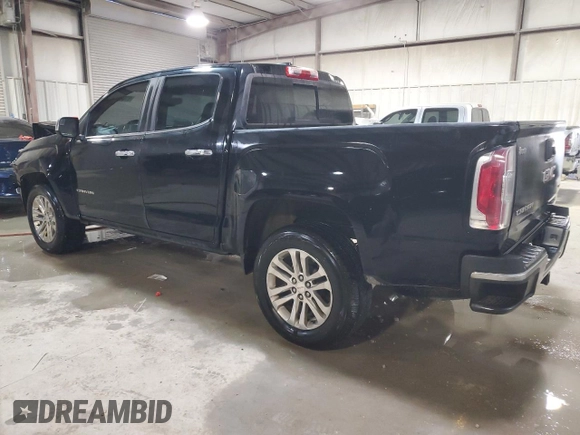 2016 GMC Canyon 2WD SLT with VIN 1GTG5DE39G1100516, listed as a Copart auction lot 87648455 with 243,815 mi miles and Salvage Title. Bid and sale history available at carsss.com. Image 2.