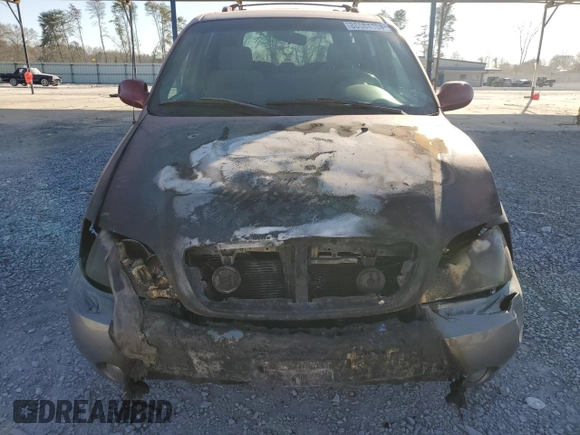 2005 Kia Sedona LX with VIN KNDUP132056683645, listed as a Copart auction lot 86584104 with 0 mi miles and Salvage Title. Bid and sale history available at carsss.com. Image 5.